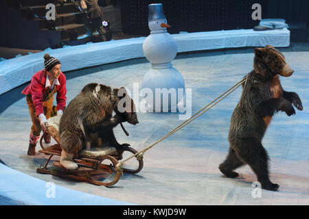 Sergey Akimov as Kai with trained bears in the circus show Snow Queen by Great Moscow circus Stock Photo