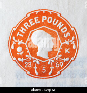 Old Inland Revenue embossed stamps on paper Stock Photo