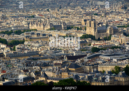 Aerial view on Paris rooftops at sunset with Notre Dame de Paris Cathedral. 4th (Latin Quarter) and 6th Arrondissment, Paris, France Stock Photo