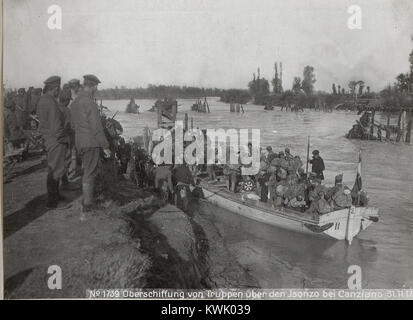 A photograph shows German troops crossing the Rhine into the Rhineland ...
