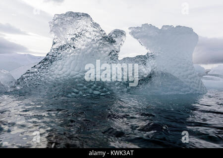 Sculpted sea ice floating in Half Moon Island; Antarctica Stock Photo