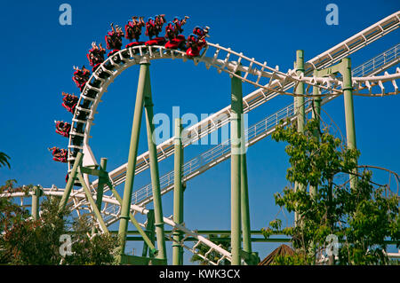 Isla Magica (Magic Island) Theme Park, The Jaguar - roller coaster (and people upside), Seville, Region of Andalusia, Spain, Europe Stock Photo