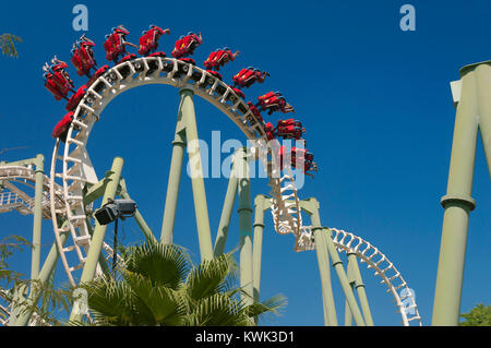 Isla Magica (Magic Island) Theme Park, The Jaguar - roller coaster (and people upside), Seville, Region of Andalusia, Spain, Europe Stock Photo