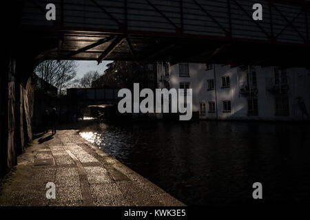 Under the bridge. I'm always been attracted to this sort of light and its reflections. This is one of the few of the catalog. Stock Photo