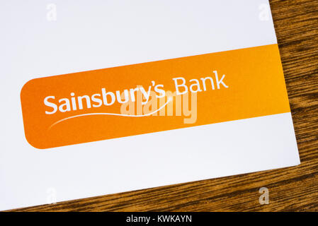 LONDON, UK - DEC 18TH 2017: The Sainsburys Bank logo, pictured on a promotional leaflet, on 18th December 2017.  Sainsburys Bank is a British bank own Stock Photo