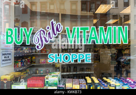 Window of a Buy Rite Vitamin Shoppe on Grand Street in Chinatown, New York City Stock Photo