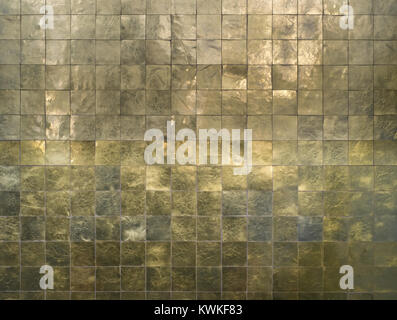 sun light reflecting on golden tiles wall Stock Photo