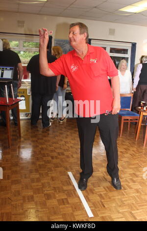 The Crafty Cockney - Eric Bristow Darts Legend - I had the chance to capture Eric with his fans at a charity auction whilst working for a newspaper! Stock Photo