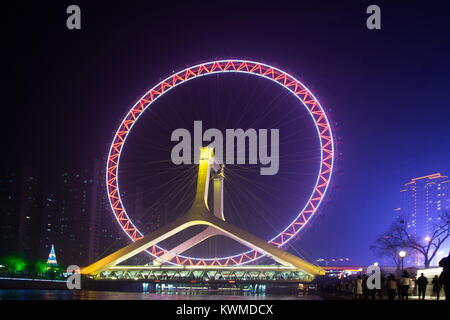 Tianji, Tianji, China. 30th Dec, 2017. Tianjin, CHINA-30th December 2017:(EDITORIAL USE ONLY. CHINA OUT) .The Eye of Tianjin is a 120-metre (394 feet) tall giant ferris wheel built above the Yongle Bridge (formerly Chihai Bridge), over the Haihe River in Tianjin, China. It is claimed to be the only such wheel to have been constructed over a bridge in the world. It is known as one of the landmarks of Tianjin City. Credit: SIPA Asia/ZUMA Wire/Alamy Live News Stock Photo