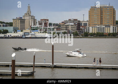 Rock Island, Iowa, USA. 2nd July, 2017. Boats and pedestrians are seen along the Mississippi River with Davenport in the background from Schwiebert Park in Rock Island on Sunday, July 2, 2017. Credit: Andy Abeyta, Quad-City Times/Quad-City Times/ZUMA Wire/Alamy Live News Stock Photo