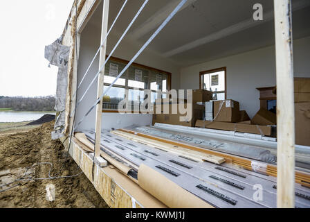 Davenport, Iowa, USA. 30th Nov, 2016. The inside of a half of one of the cabins is seen at West Lake Park in Davenport on Wednesday, November 30, 2016. West Lake Park welcomes two new pre-constructed cabins to be set on a plot of land overlooking Railroad Lake. Credit: Andy Abeyta/Quad-City Times/ZUMA Wire/Alamy Live News Stock Photo