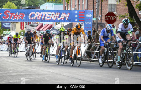 Davenport, Iowa, USA. 29th May, 2017. Racers in the men's pro race cross the finish line with just a few laps to go during the Kwik Star Criterium in the Village of East Davenport on Monday, May 29, 2017. Formerly known as the Quad-Cities Criterium, the gathering of cyclists marked the 52nd annual iteration of the event. Credit: Andy Abeyta, Quad-City Times/Quad-City Times/ZUMA Wire/Alamy Live News Stock Photo