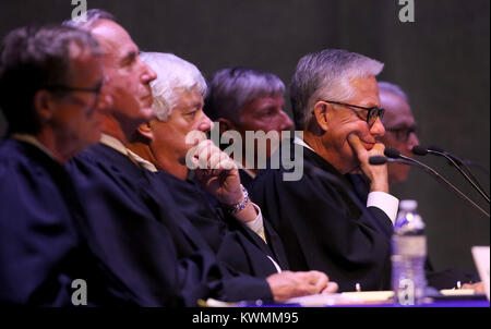 Davenport, Iowa, USA. 12th Oct, 2017. Chief Justice Mark Cady (Right) of the Iowa Supreme Court listens to arguments by attorney Courtney Wilson of Davenport, Thursday, October 12, 2017, during a special session of the Iowa Supreme Court held in the Performing Arts Center at Davenport Central High School. She is representing the appellant, Carlos Ariel Gomez Garcia in the case. Credit: John Schultz/Quad-City Times/ZUMA Wire/Alamy Live News Stock Photo