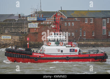 Portsmouth, UK. 4th January 2018. SMS Towage now provide commercial towing services at Portsmouth International Port, Portsmouth, UK. Tugs Guardsman and Irishman are on call to assist merchant vessels in and out of port. Credit: Neil Watkin / Alamy Live News Stock Photo