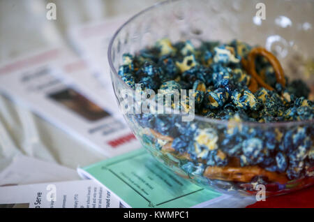 Davenport, Iowa, USA. 20th Aug, 2017. Blue-dyed popcorn is seen on tables at the Duck Creek Lodge in Davenport on Sunday, August 20, 2017. Scott County Democrats held their summer picnic with four candidates for Iowa governor in attendance. Credit: Andy Abeyta, Quad-City Times/Quad-City Times/ZUMA Wire/Alamy Live News Stock Photo