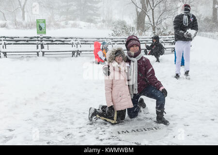 New York, United States. 04th Jan, 2018. People paid tribute to John Lennon at Strawberry Field in Central Park under heavy snow storm, cold and wind Credit: lev radin/Alamy Live News Stock Photo
