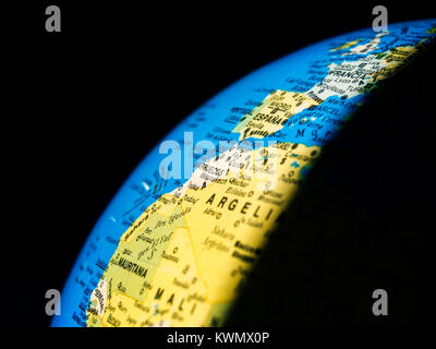 Day and night simulation on an political map earth globe Stock Photo