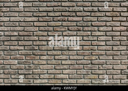 A strong clean brown brick wall Stock Photo