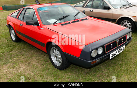 Three-quarter front view of a  Red, 1982 Lancia Montecarlo, on static display at the 2017 Silverstone Classic Stock Photo