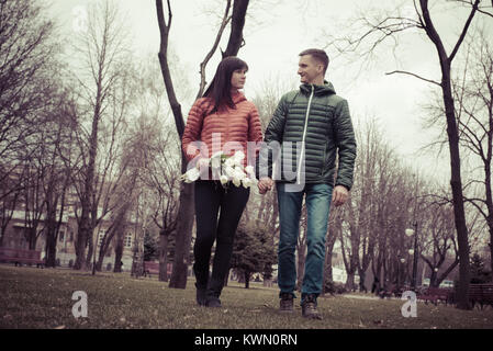 Date of middle aged Loving couple in spring sity park Stock Photo