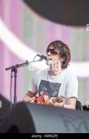 The English rock band Spiritualized performs a live concert at the main stage at the Barclaycard British Summer Time festival 2014 at Hyde Park, London. Here lead singer and guitarist Jason Pierce is picttured live on stage. UK 05.07.2014. Stock Photo