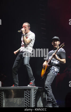 The American rock band Linkin Park performs a live concert at the O2 Arena in London. Here lead vocalist Chester Bennington (L) is pictured live on stage with guitarist and rapper Mike Shinoda (R). UK, 23/11 2014. Stock Photo