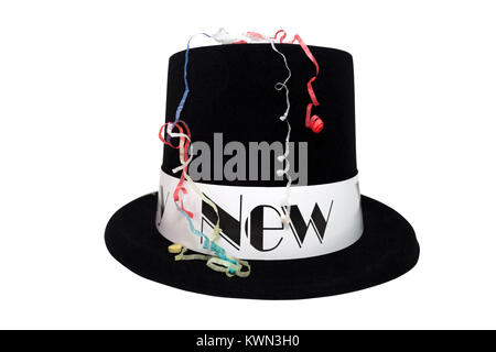 Isolated black New Year's costume top hat with confetti streamers. Stock Photo