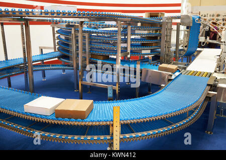 Conveyor belt to move around the factory goods Stock Photo