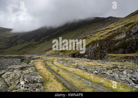 Rough track at Cwmorthin quarry near Blaenau Ffestiniog, North Wales. Stock Photo