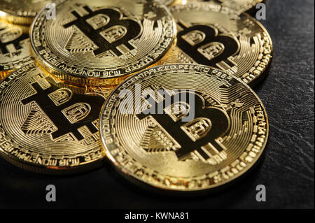 Golden bitcoins on luxury dark leather Stock Photo