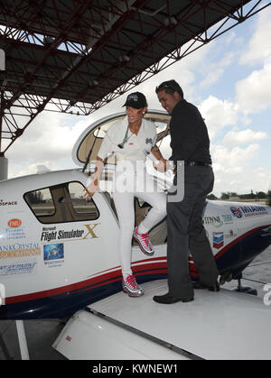 MIAMI, FL - APRIL 30: Basket Ball Wife star Evelyn Lozada participates in a Rally for Kids with Cancer Scavenger Cup. Evelyn Lozada is of Puerto Rican ancestry and grew up in Bronx, New York.  She is the ex-fiancee of basketball star Antoine Walker. She co-owns an upscale shoe boutique in Coral Gables, Florida called Dulce. She has a teenage daughter named Shaniece. Lozada is currently Married to NFL wide receiver Chad Ochocinco.  on April 30, 2011 in Miami, Florida.    People:  Evelyn Lozada Stock Photo