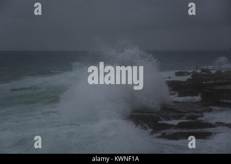 Waves breaking on the shore of the Mediterranean sea in winter Stock Photo