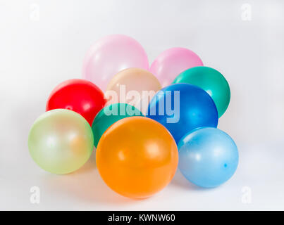 Colorful balloons of diferent colors on white background Stock Photo