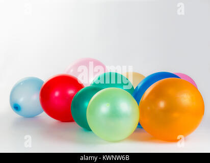 Colorful balloons of diferent colors on white background Stock Photo