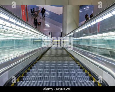 View down on escalator & travelers; Dallas/Fort Worth International Airport; Dallas; Texas; USA Stock Photo