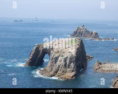 View from Carn Cheer of Enys Dodnan Islet and Armed Knight Islet in the Background, Penwith Peninsula, Cornwall, England, UK in Summer Stock Photo