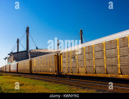 Freight train stationed in front of the Alamodome in San Antonio, Texas Stock Photo