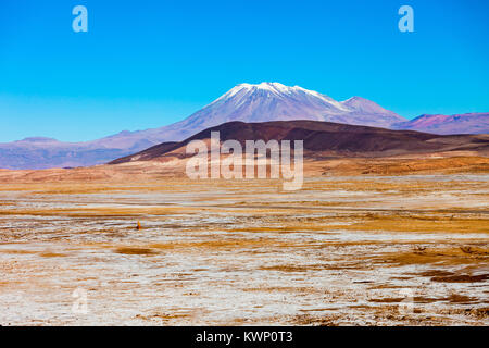 Ollague stratovolcano in the Andes, on the border between Bolivia and Chile. Stock Photo