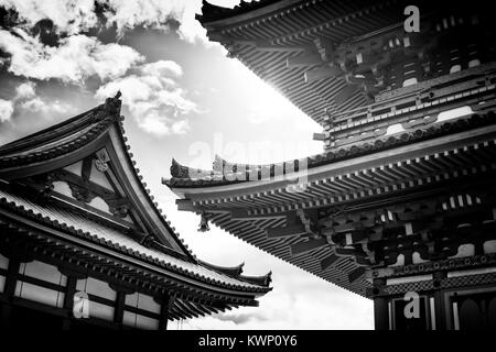 Architectural detail of Sanjunoto pagoda building at Kiyomizu-dera Buddhist temple in Kyoto, Japan in Black and white Stock Photo