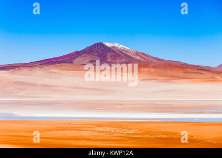 Volcano and lake on the bolivian Altiplano Stock Photo