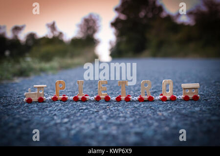 Toy decorating train with letter forming the italian name Pietro Stock Photo