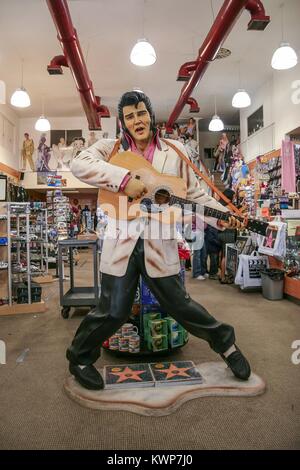 HOLLYWOOD, CALIFORNIA, USA, DECEMBER 10, 2006 - A statue of Elvis Presley is displayed in a souvenir shop on Hollywood Boulevard. Stock Photo