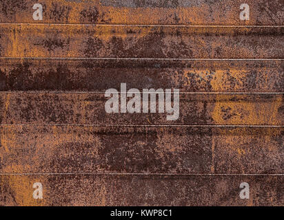 Rusty ginger metal old times, background in brown tones Stock Photo