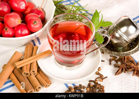 Tea, apples, herbs, cinnamon and star anise Stock Photo