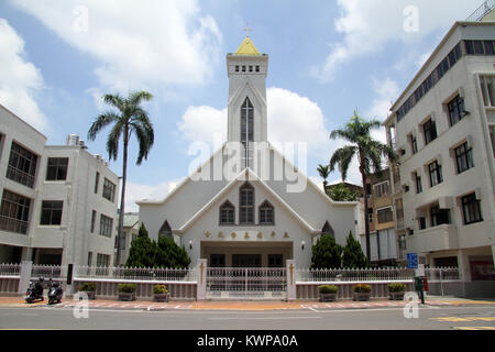 New white chirch on the street of Tainan, Taiwan Stock Photo
