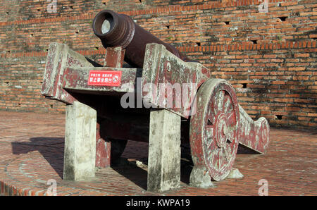 Old bronze gun and wall of Anping fort in Tainan, Taiwan Stock Photo