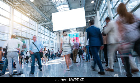 Business People Walking on trade fair Stock Photo