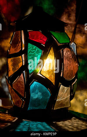 Illuminated Arabic lantern in colorful background. Ramadan 