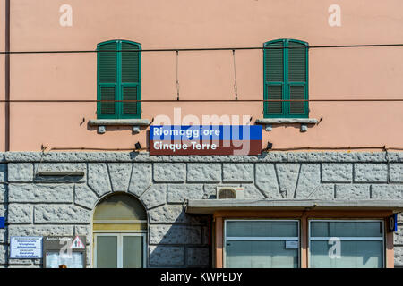 The railway train station and village sign for Riomaggiore Italy on the coast of the Cinque Terre Stock Photo