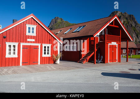 Henningsvaer, Norway - August 19,2017: Picturesque fishing port in Henningsvaer on Lofoten islands, Norway with typical red wooden buildings and small Stock Photo